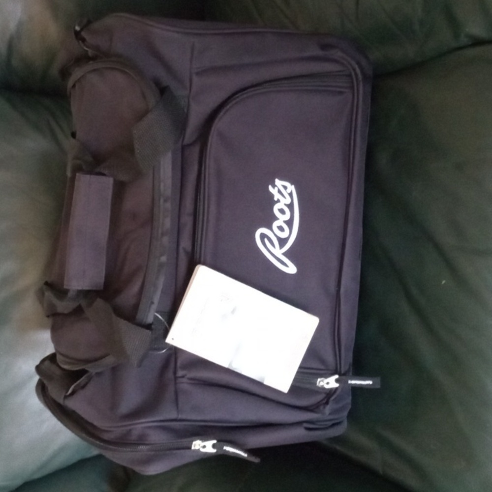 Brand New 32L Black Roots Duffle Bag